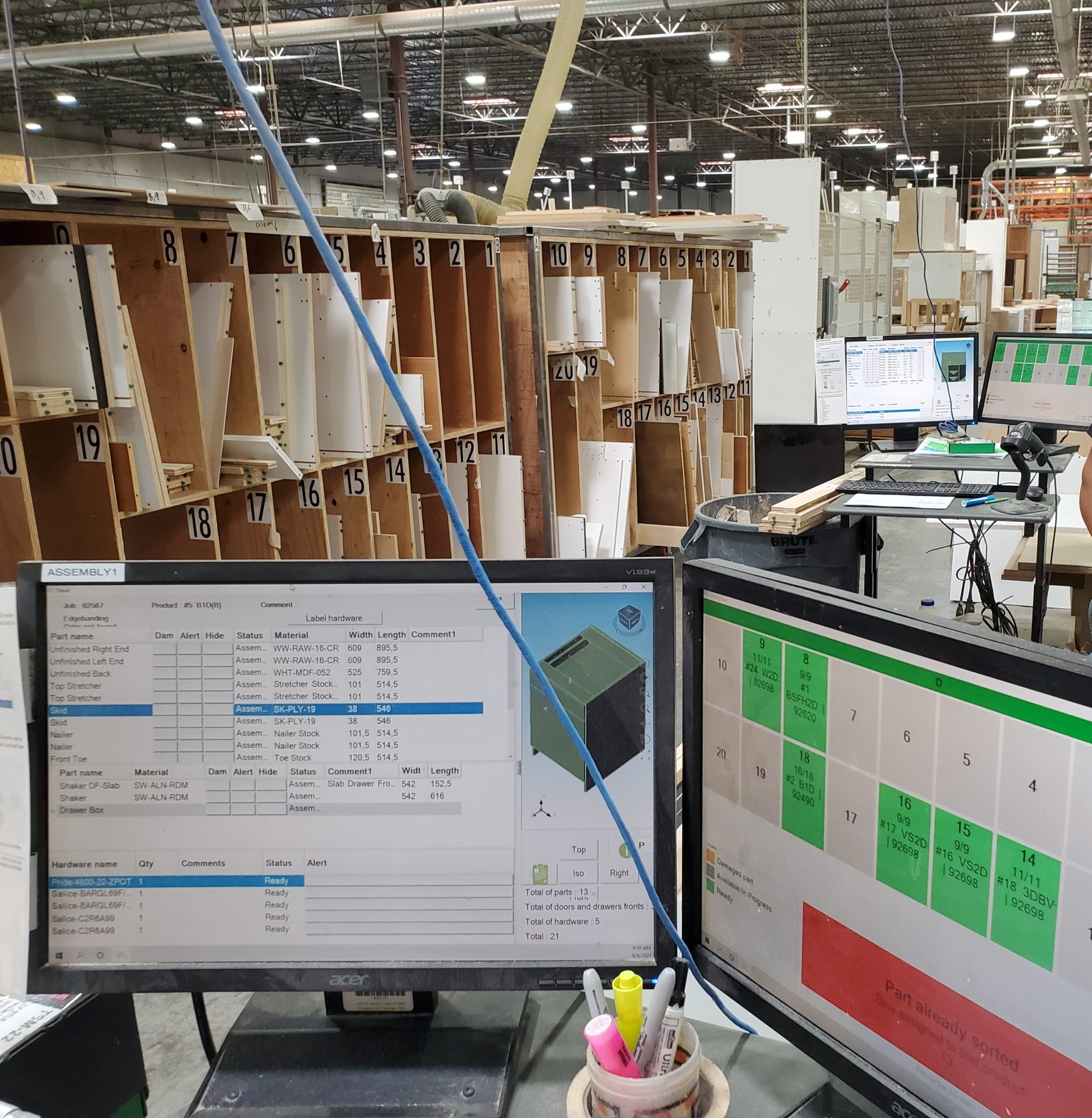 Ridge Crest Custom Cabinetry Sorting Area with Production Coach